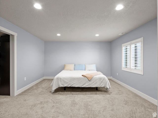 9558 S Lea Heather Way, West Jordan, UT 84081 - bedroom featuring carpet flooring, recessed lighting, a textured ceiling, and baseboards