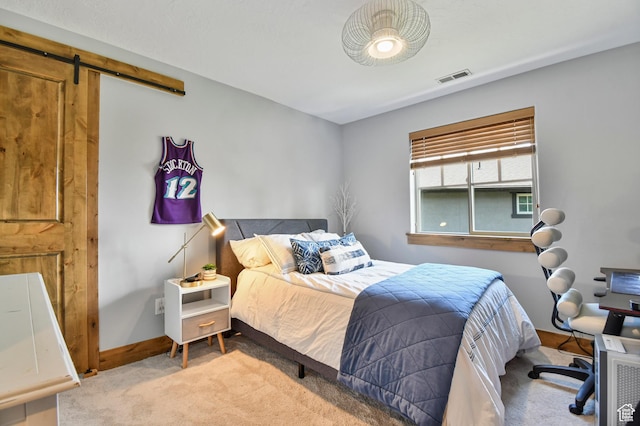 7841 Engen Loop, Park City, UT 84098 - carpeted bedroom featuring a barn door and baseboards