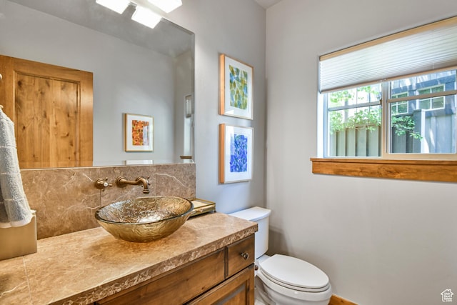 7841 Engen Loop, Park City, UT 84098 - half bathroom featuring backsplash, toilet, and vanity