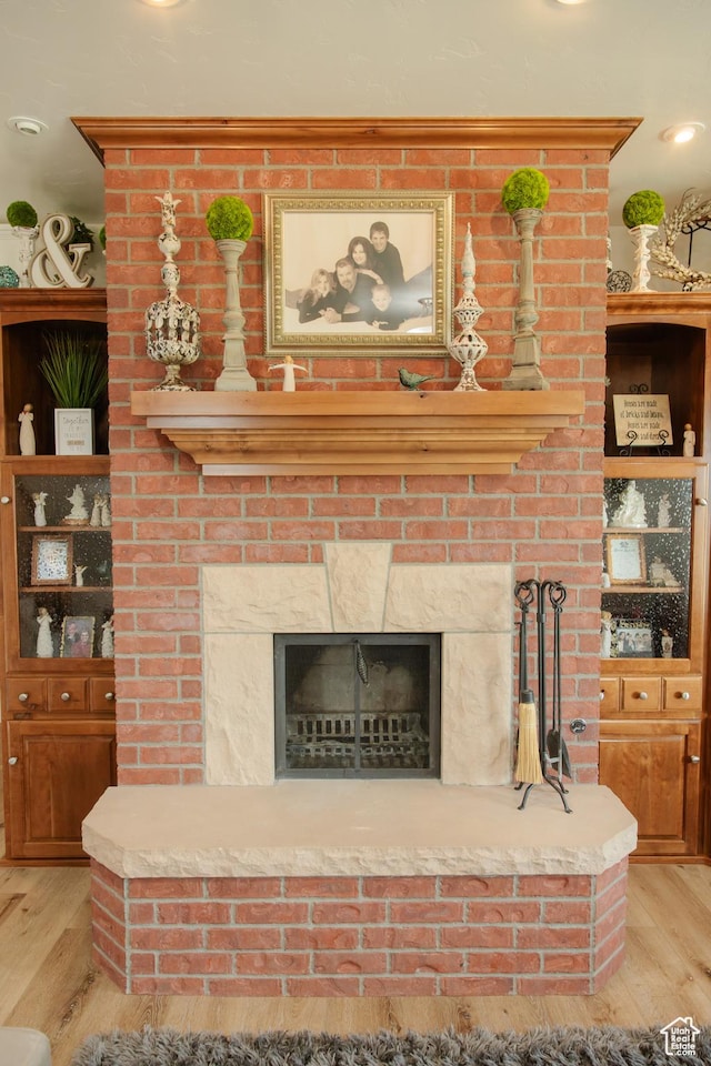 1380 N 300 W, Blanding, UT 84511 - detailed view of wood finished floors and a fireplace
