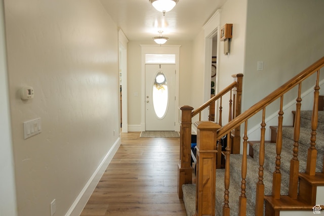 1380 N 300 W, Blanding, UT 84511 - entryway with wood finished floors, stairway, and baseboards