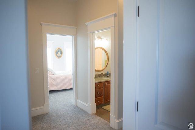 1380 N 300 W, Blanding, UT 84511 - hall with carpet flooring, a sink, and baseboards