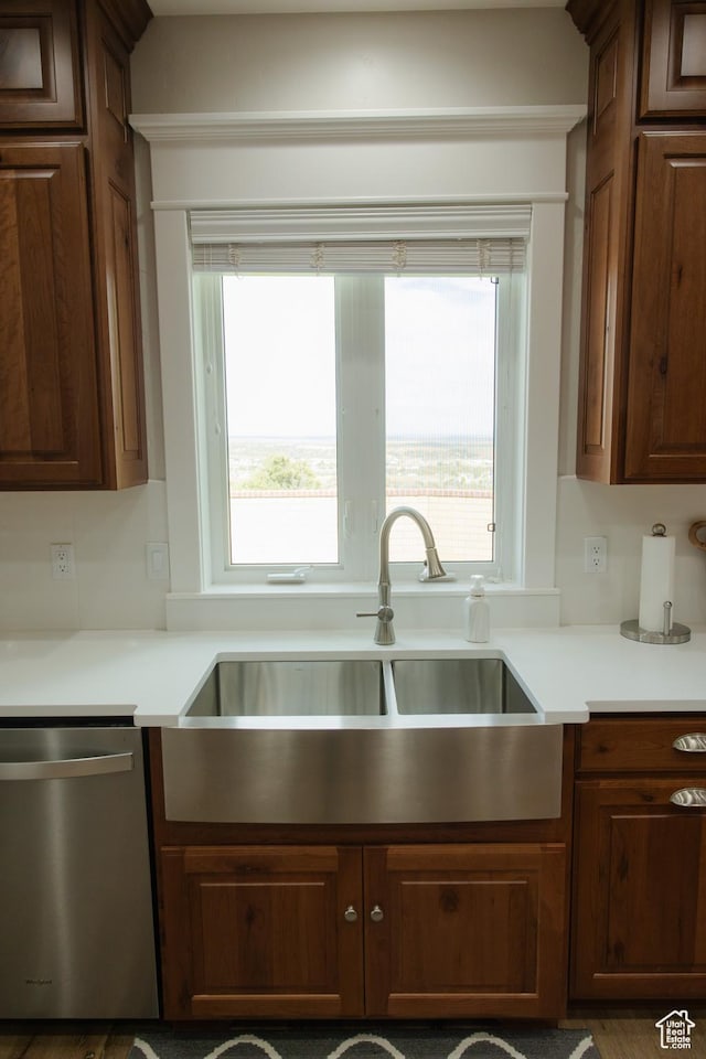 1380 N 300 W, Blanding, UT 84511 - kitchen featuring stainless steel dishwasher, a sink, light countertops, and healthy amount of natural light