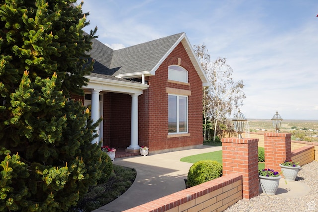 1380 N 300 W, Blanding, UT 84511 - view of front facade featuring a shingled roof and brick siding