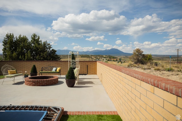 1380 N 300 W, Blanding, UT 84511 - view of patio featuring a fire pit and a mountain view