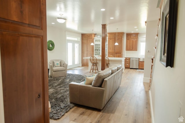 1380 N 300 W, Blanding, UT 84511 - living area with plenty of natural light, light wood finished floors, recessed lighting, and baseboards
