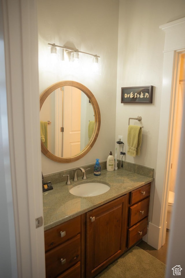 1380 N 300 W, Blanding, UT 84511 - bathroom featuring vanity, toilet, and tile patterned flooring