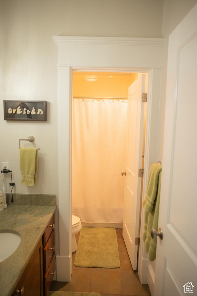 1380 N 300 W, Blanding, UT 84511 - full bathroom featuring vanity, toilet, a shower with shower curtain, and tile patterned floors