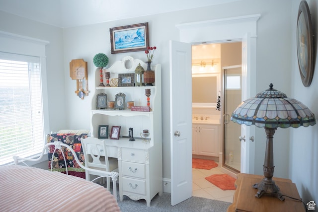 1380 N 300 W, Blanding, UT 84511 - bedroom with light tile patterned floors, connected bathroom, and a sink