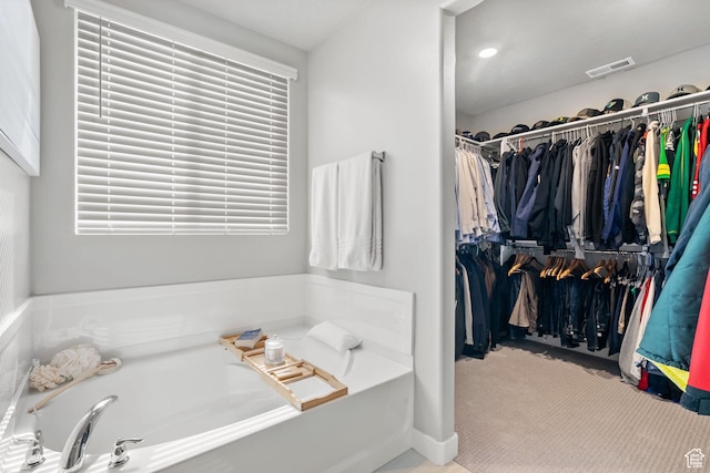 4185 W 800 S, Syracuse, UT 84075 - bathroom with a garden tub and a walk in closet