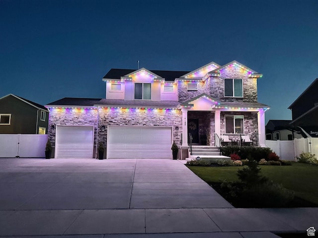 4185 W 800 S, Syracuse, UT 84075 - craftsman-style home featuring a porch, stone siding, driveway, and a garage