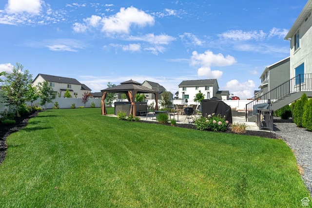 4185 W 800 S, Syracuse, UT 84075 - view of yard with a patio, a gazebo, a hot tub, a residential view, and stairs