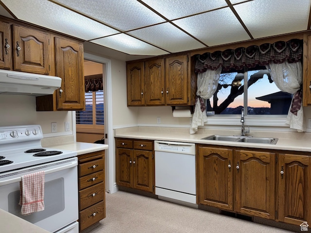 2650 S 2000 W, Syracuse, UT 84075 - kitchen with white appliances, a sink, under cabinet range hood, and light countertops