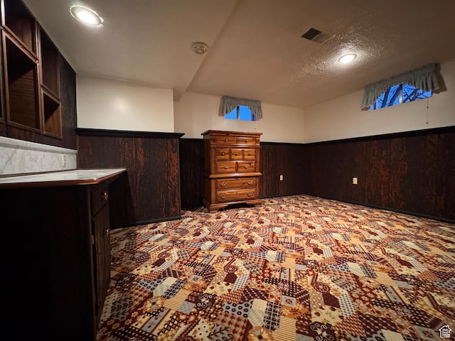 2650 S 2000 W, Syracuse, UT 84075 - finished below grade area with wainscoting, a textured ceiling, recessed lighting, and carpet