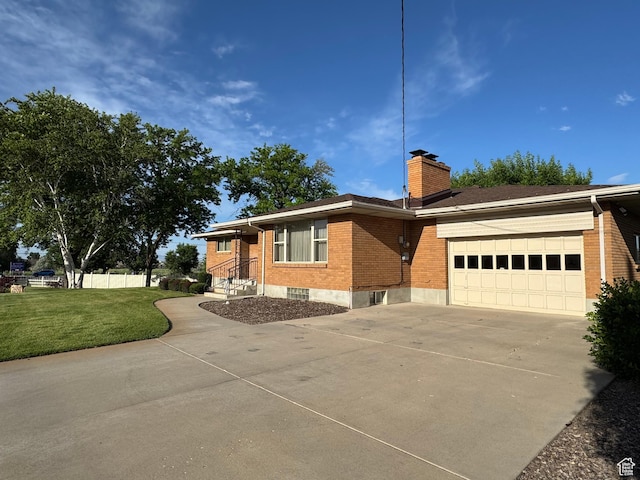 2650 S 2000 W, Syracuse, UT 84075 - ranch-style home featuring concrete driveway, a garage, brick siding, and a chimney