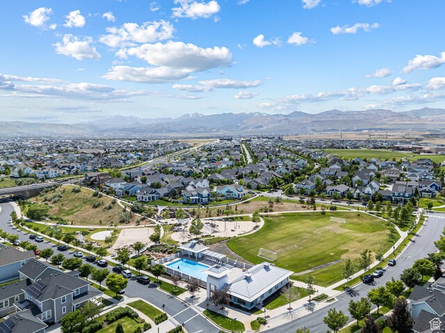 5228 W S Jordan Pkwy, South Jordan, UT 84009 - aerial view of property's location featuring nearby suburban area, a mountain backdrop, and a pool