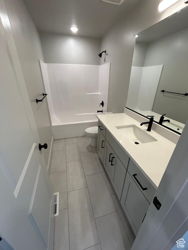 570 N 600 W, Smithfield, UT 84335 - bathroom with vanity, toilet, shower / bathtub combination, and tile patterned floors