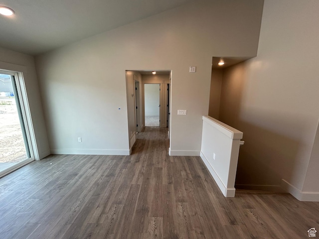 570 N 600 W, Smithfield, UT 84335 - empty room featuring baseboards, wood finished floors, and lofted ceiling