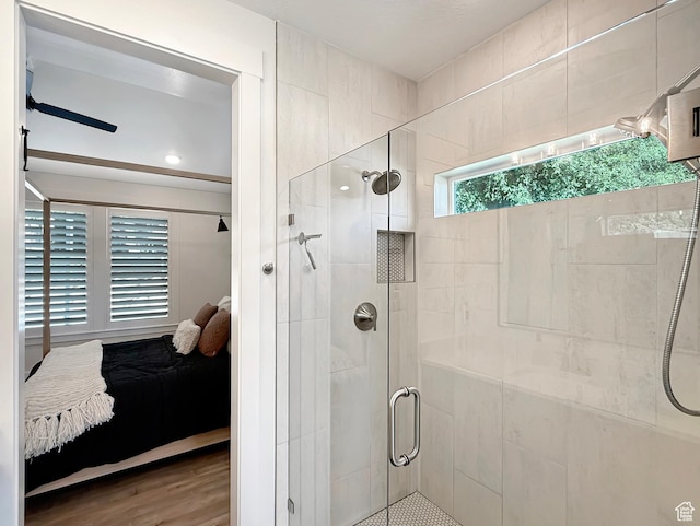 2558 N 1150 E, North Ogden, UT 84414 - full bath featuring ensuite bath, a shower stall, and wood finished floors