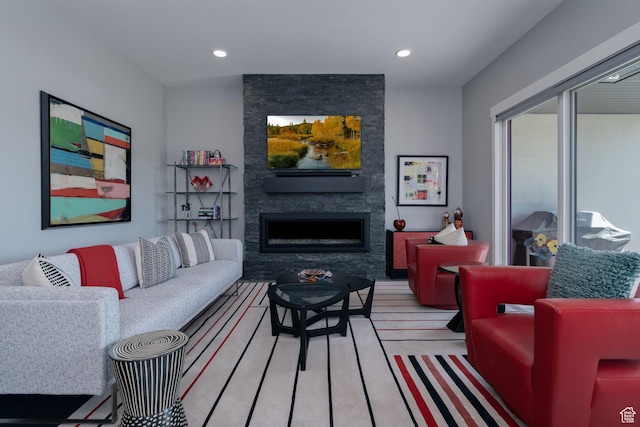 11579 N Groves Edge Dr, Hideout, UT 84036 - living room with a stone fireplace, recessed lighting, and light wood-type flooring