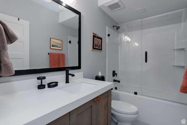 11579 N Groves Edge Dr, Hideout, UT 84036 - bathroom featuring vanity, toilet, and bath / shower combo with glass door
