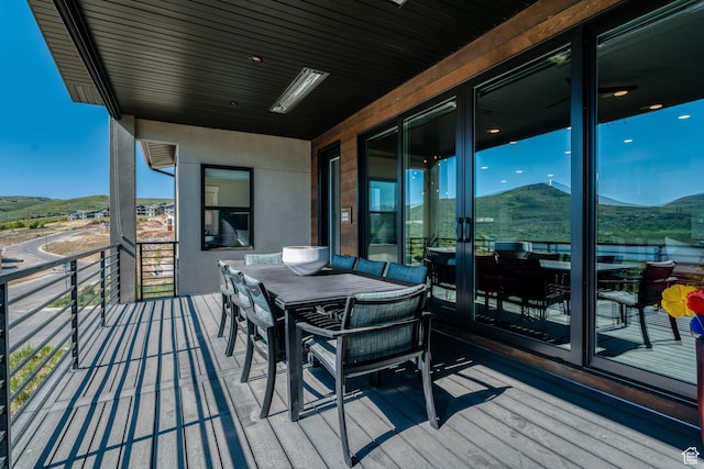 11579 N Groves Edge Dr, Hideout, UT 84036 - wooden terrace featuring a mountain view and outdoor dining space