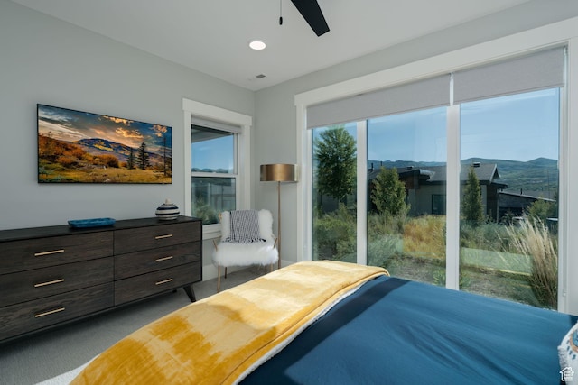 11579 N Groves Edge Dr, Hideout, UT 84036 - carpeted bedroom featuring a ceiling fan and recessed lighting