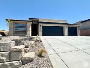 579 S 1800 W, Hurricane, UT 84737 - view of front of property featuring a garage and concrete driveway