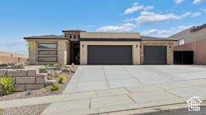 579 S 1800 W, Hurricane, UT 84737 - view of front of house featuring a garage and concrete driveway