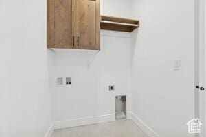 579 S 1800 W, Hurricane, UT 84737 - washroom featuring cabinet space, washer hookup, electric dryer hookup, and baseboards