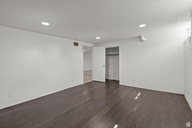 3025 N 250 E, Provo, UT 84604 - unfurnished bedroom with wood finished floors, a textured ceiling, recessed lighting, and a closet