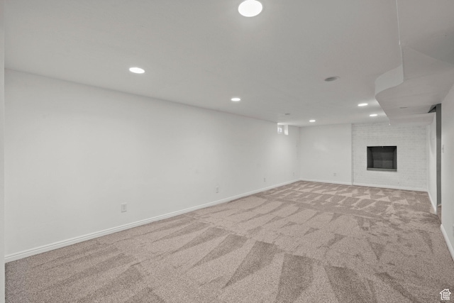 3025 N 250 E, Provo, UT 84604 - finished basement with light carpet, recessed lighting, baseboards, and a brick fireplace