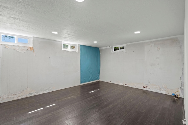 3025 N 250 E, Provo, UT 84604 - basement featuring wood finished floors, recessed lighting, a textured ceiling, and plenty of natural light