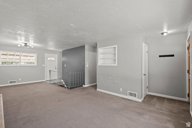 3025 N 250 E, Provo, UT 84604 - carpeted entryway featuring a textured ceiling and baseboards