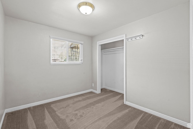 3025 N 250 E, Provo, UT 84604 - unfurnished bedroom featuring a closet, carpet flooring, and baseboards