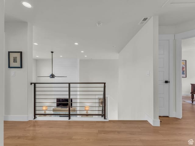 569 W Cascade Loop, Midway, UT 84049 - hall with wood finished floors, baseboards, recessed lighting, and an upstairs landing