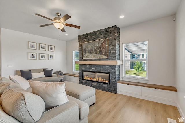 753 N Stallion Dr Unit 601, Spanish Fork, UT 84660 - living area featuring healthy amount of natural light, ceiling fan, light wood-style flooring, a fireplace, and recessed lighting