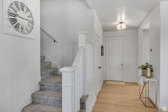 753 N Stallion Dr Unit 601, Spanish Fork, UT 84660 - entryway with light wood-type flooring, stairs, and baseboards