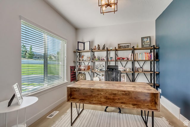 753 N Stallion Dr Unit 601, Spanish Fork, UT 84660 - office space with plenty of natural light, wood finished floors, baseboards, and a chandelier