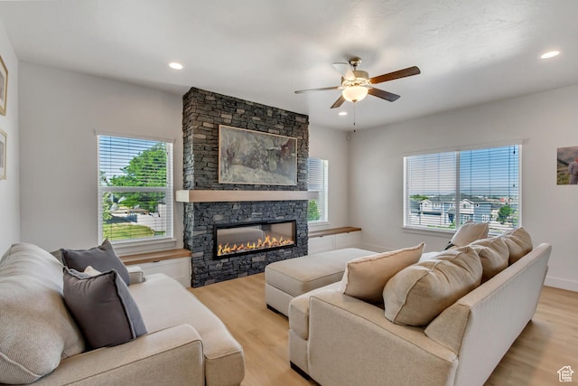 753 N Stallion Dr Unit 601, Spanish Fork, UT 84660 - living room featuring ceiling fan, light wood-style floors, a fireplace, and recessed lighting