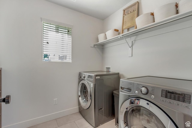 753 N Stallion Dr Unit 601, Spanish Fork, UT 84660 - laundry room featuring washing machine and clothes dryer, light tile patterned floors, and baseboards