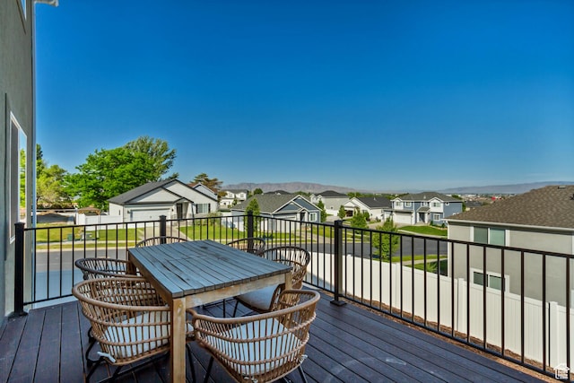 753 N Stallion Dr Unit 601, Spanish Fork, UT 84660 - wooden deck featuring a residential view, outdoor dining space, and a mountain view