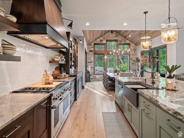 1156 N Valley View Dr, Eden, UT 84310 - kitchen with open shelves, appliances with stainless steel finishes, a sink, vaulted ceiling, and healthy amount of natural light