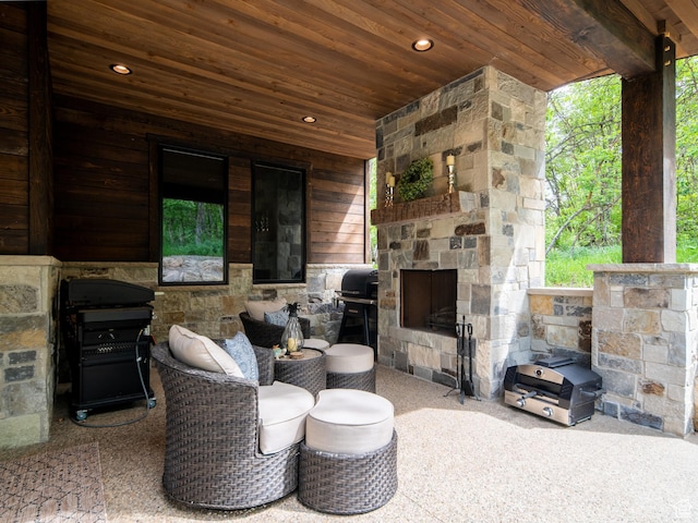 1156 N Valley View Dr, Eden, UT 84310 - view of patio / terrace featuring an outdoor stone fireplace and grilling area