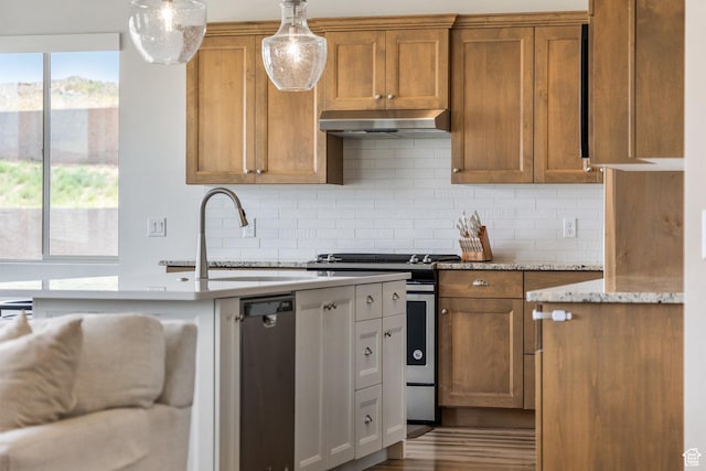 1432 Boys Pond Cir, Santa Clara, UT 84765 - kitchen featuring stainless steel gas range oven, under cabinet range hood, a sink, and brown cabinetry