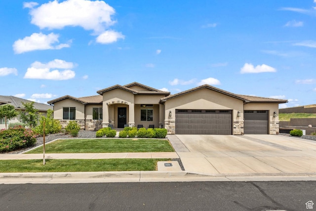 1432 Boys Pond Cir, Santa Clara, UT 84765 - view of front of house with stone siding, an attached garage, stucco siding, and concrete driveway