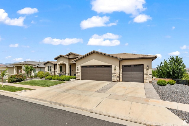 1432 Boys Pond Cir, Santa Clara, UT 84765 - view of front of house with a garage, stucco siding, driveway, stone siding, and a front lawn