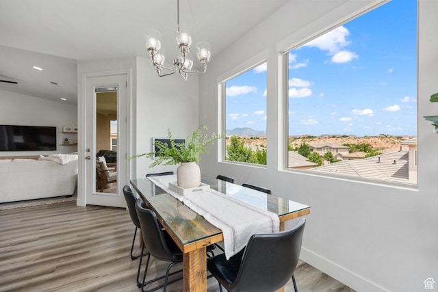 1432 Boys Pond Cir, Santa Clara, UT 84765 - dining area with wood finished floors, a chandelier, baseboards, and recessed lighting