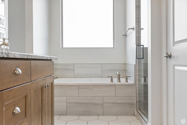 1432 Boys Pond Cir, Santa Clara, UT 84765 - bathroom with vanity, a garden tub, and a stall shower