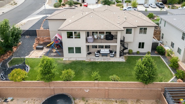 1432 Boys Pond Cir, Santa Clara, UT 84765 - rear view of property featuring a patio area, stucco siding, outdoor lounge area, a balcony, and a tile roof